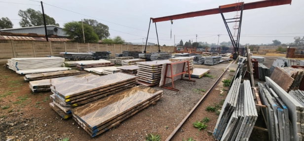 Granite slabs stacked in outdoor stock yard in Parys