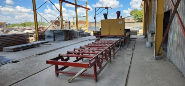 Industrial granite polishing equipment inside Granslab workshop